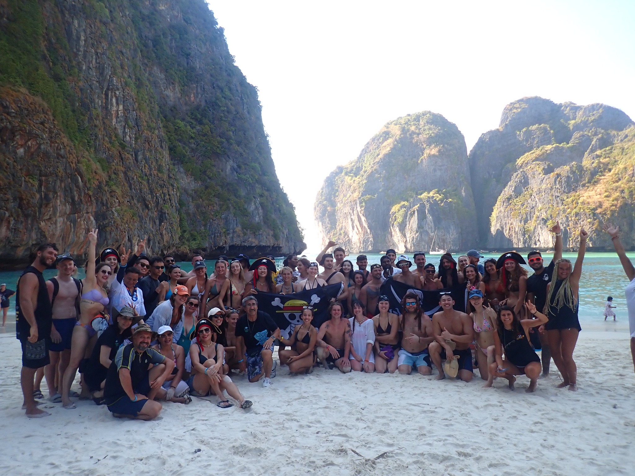 group photo during phi phi island tour with pirate boat taken at maya bay