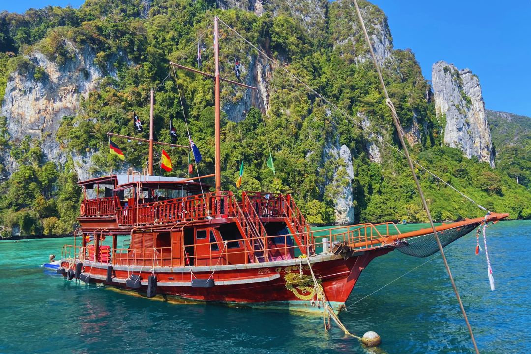 photo of phi phi pirate ship in sea at koh phi phi